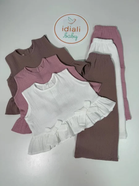 Muslin suit with bows